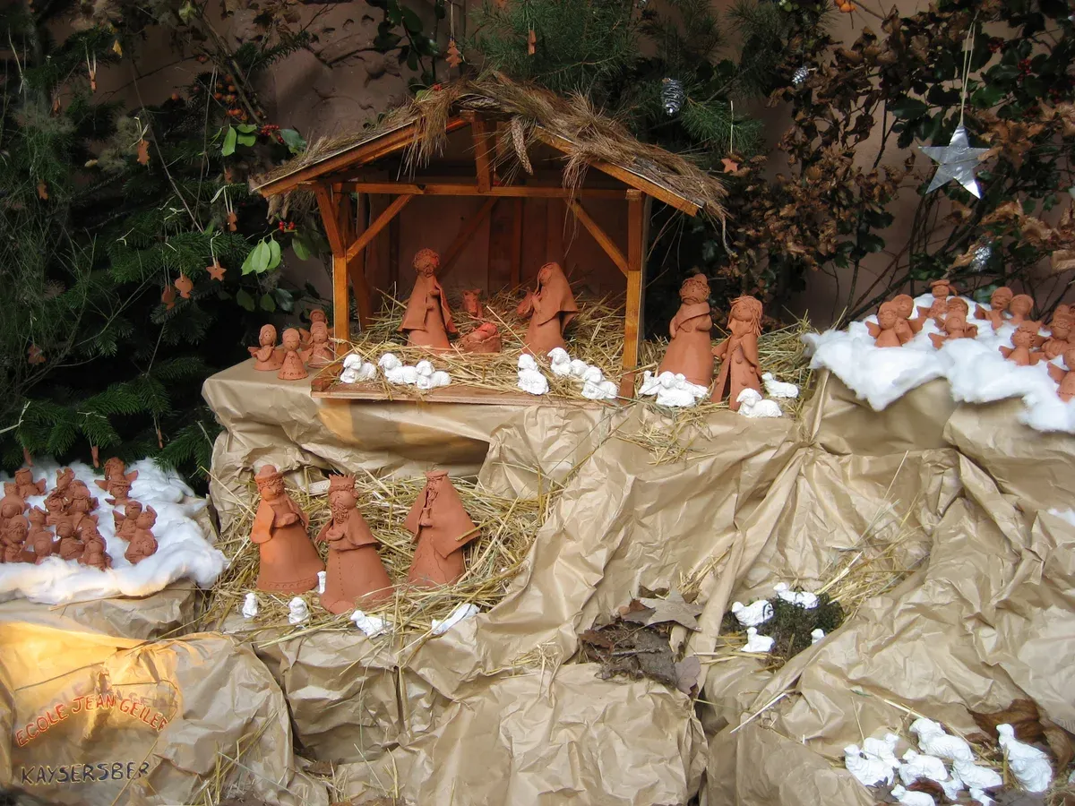 Nativity scene with terracotta figures at a Christmas display in Kaysersberg