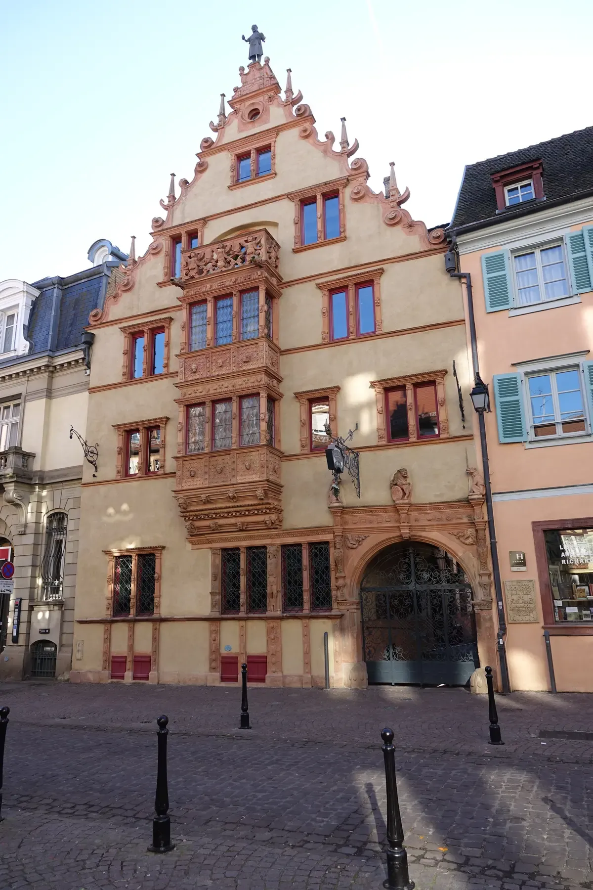 Maison des Têtes in Colmar with its stepped gable and carved oriel